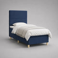 Letto singolo imbottito blu scuro con testiera alta, rete 90 × 200 cm, dimensioni 100 × 214 × 135 cm, rivestimento in tessuto e struttura in legno